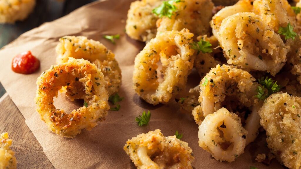 anelli-di-calamari-gratinati-al-forno,-piu-buoni-di-quelli-fritti.-ecco-il-segreto-per-renderli-super-croccanti